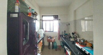 Kitchen in 1 BHK Apartment at KM Horizon Flora, Ghodbunder Road – for Sale