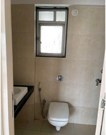 Bathroom in 2 BHK Apartment at Puranik Capitol, Ghodbunder Road – for Sale