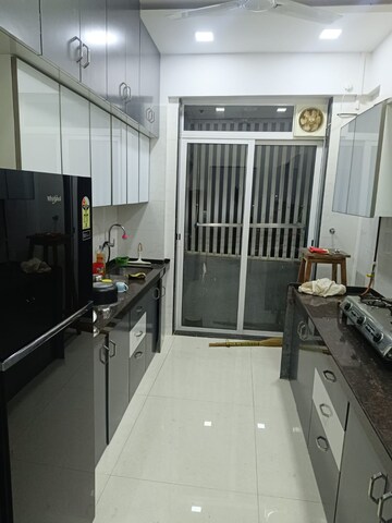 Kitchen in 2 BHK Apartment at Shreeji Atlantis, Malad West – for Rent