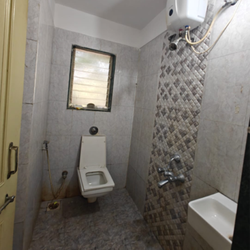 Bathroom in 1 BHK Apartment at Sanjay Park – for Rent