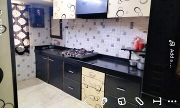 Kitchen in 2 BHK Apartment at Dar Us Salaam CHS, Agripada – for Sale
