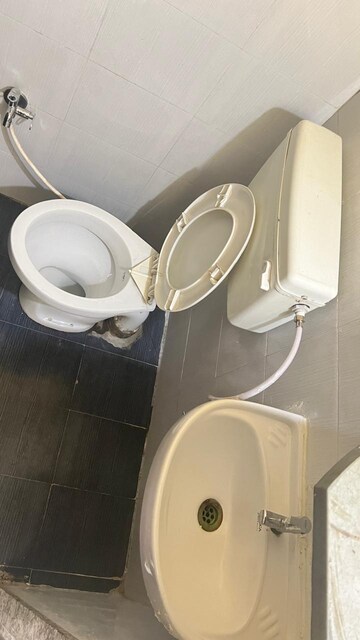 Bathroom in 2 BHK Apartment at Sahaj Solarium, Vasna – for Rent