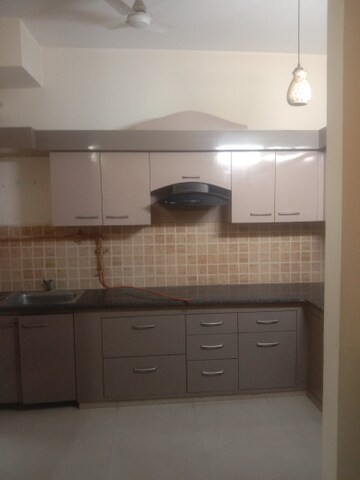 Kitchen in 3 BHK Apartment at Mahagun Mywoods, Sector 16c Greater Noida – for Rent
