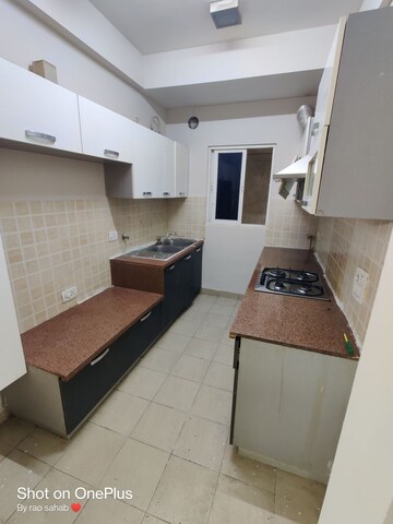 Kitchen in 2.5 BHK Apartment at Mahagun Moderne, Sector 78 – for Rent