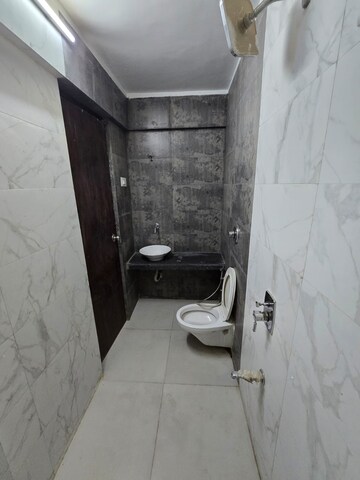 Bathroom in 2 BHK Apartment at Rajesh Presidency, Ulwe Sector 3 – for Rent
