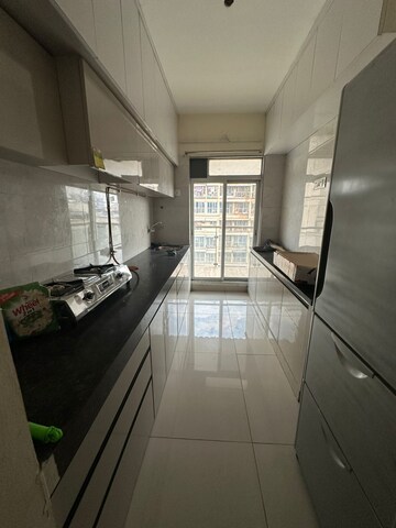 Kitchen in 2 BHK Apartment at Rajesh Presidency, Ulwe Sector 3 – for Rent