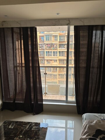 Living Room in 2 BHK Apartment at Rajesh Presidency, Ulwe Sector 3 – for Rent