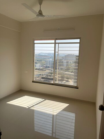 Room in 2 BHK Apartment at Swastik Prism City Violet, Charholi Budruk – for Sale