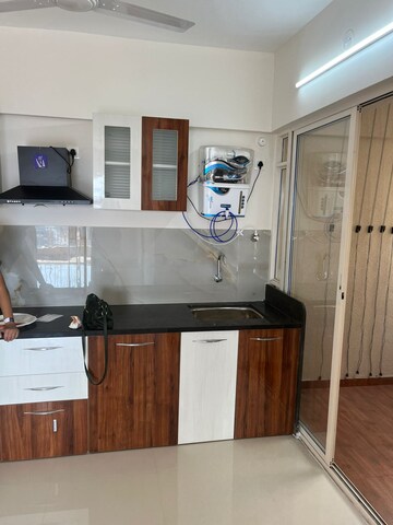 Kitchen in 2 BHK Apartment at Swastik Prism City Violet, Charholi Budruk – for Sale