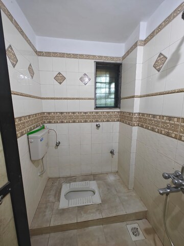 Bathroom in 2 BHK Apartment at Safal Residency, Nerul – for Sale