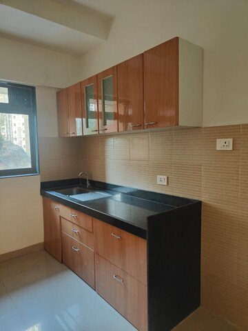 Kitchen in 2 BHK Apartment at Lodha Splendora, Ghodbunder Road – for Sale