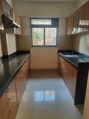 Kitchen in 2 BHK Apartment at Lodha Splendora, Ghodbunder Road – for Sale