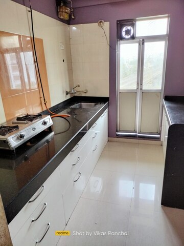 Kitchen in 2 BHK Apartment at Ratnakar CHS, Andheri West – for Rent