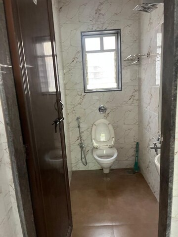 Bathroom in 2 BHK Apartment at Mahadkar Residency, Paud Road – for Rent