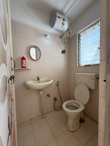 Bathroom in 3 BHK Apartment at Amrut Runwal Paradise, Kothrud – for Rent
