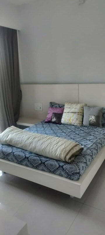 Bedroom in 2 BHK Apartment at Sheth Vasant Lawns, Laxmi Nagar – for Rent