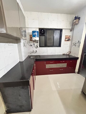 Kitchen in 2 BHK Apartment at Vanashree Apartment, Hadapsar – for Rent