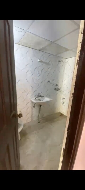 Bathroom in 2 BHK Apartment at Charms Castle, Raj Nagar Extension – for Sale
