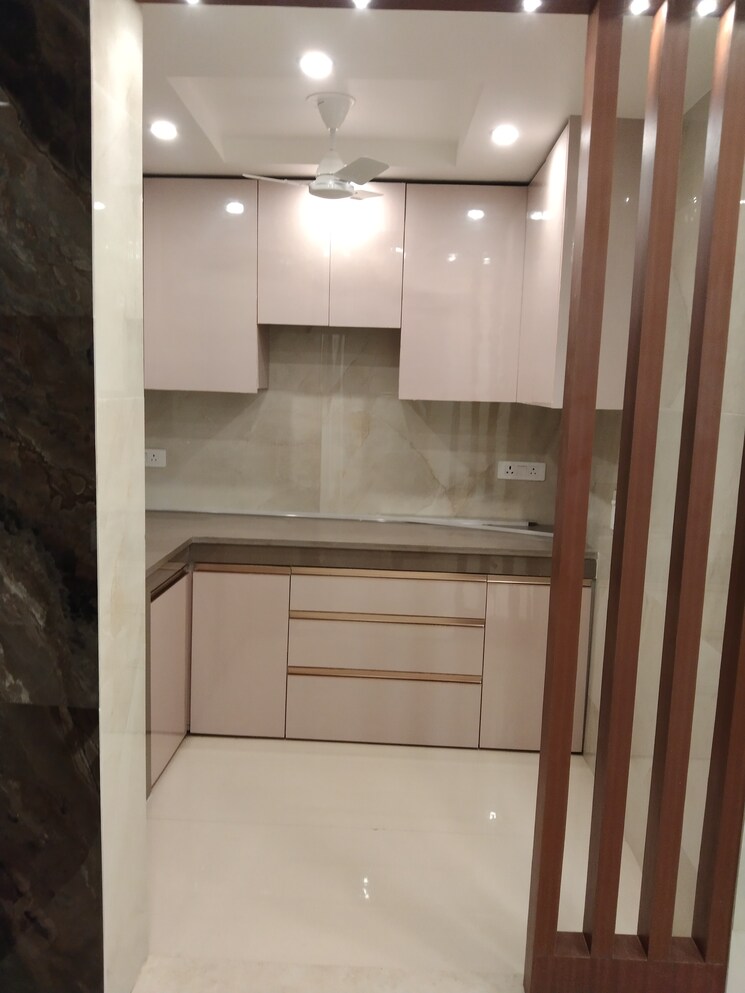 Kitchen, nidhi-exclusive-floors 3 Bedroom 1100 Sq.Ft. Apartment In Mehrauli Delhi 8150461