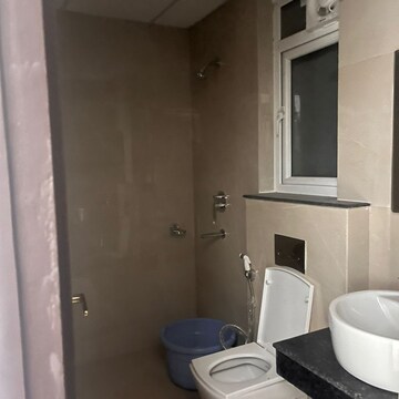 Bathroom in 2 BHK Apartment at Rishita Manhattan, Sarsawan – for Rent