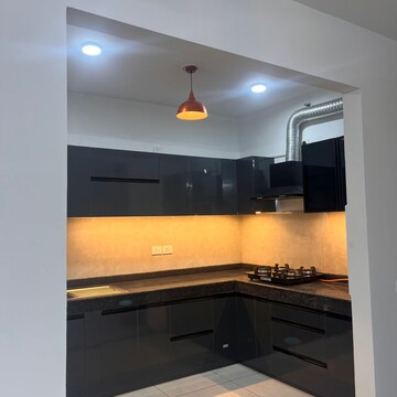 Kitchen in 2 BHK Apartment at Rishita Manhattan, Sarsawan – for Rent