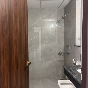 Bathroom in 2 BHK Apartment at Rishita Manhattan, Sarsawan – for Rent
