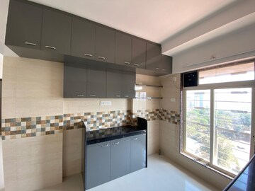 Kitchen in 2 BHK Apartment at Shree Riddhi Siddhi Sumukh Hills, Kandivali East – for Sale