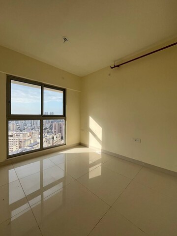 Room in 2 BHK Apartment at Shapoorji Pallonji Astron, Kandivali East – for Sale