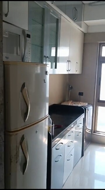 Kitchen in 2 BHK Apartment at Sheth Vasant Oasis, Andheri East – for Rent