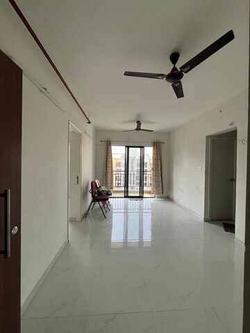 Living Room in 1 BHK Apartment at Runwal Gardens, Dombivli East – for Rent