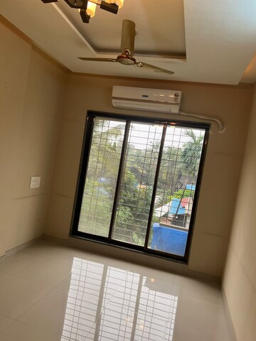 Bedroom in 2 BHK Apartment at Orchid Galaxy Apartments, Vasai East – for Rent