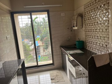 Kitchen in 2 BHK Apartment at Orchid Galaxy Apartments, Vasai East – for Rent