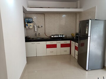 Kitchen in 2 BHK Apartment at Mittal Brothers Whistling Palms, Wakad – for Rent