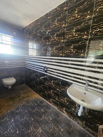Bathroom in 3 BHK Apartment at Lalpur – for Sale