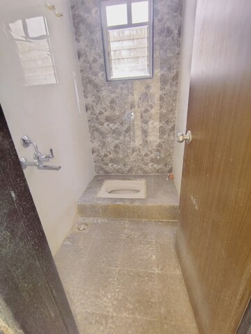 Bathroom in 2.5 BHK Apartment at Vardhaman Palm Rose, Punawale – for Rent