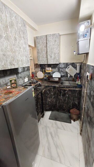 Kitchen in 1 BHK Apartment at Sector 23 Dwarka – for Rent