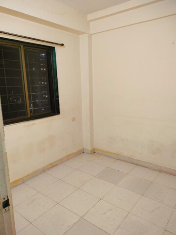 Living Room in 1 BHK Apartment at Megh Malhar Co-op Housing Society, Ghansoli – for Rent