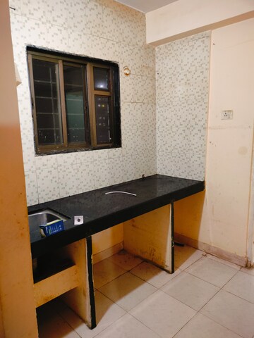 Kitchen in 1 BHK Apartment at Megh Malhar Co-op Housing Society, Ghansoli – for Rent