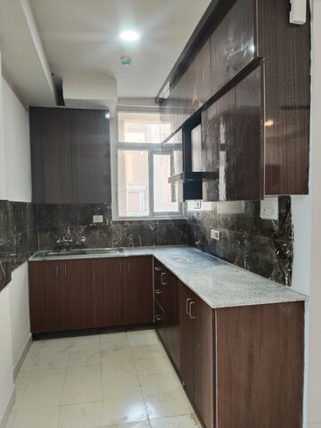 Kitchen in 3 BHK Apartment at Amrapali Riverview, Amrapali Leisure Valley – for Rent
