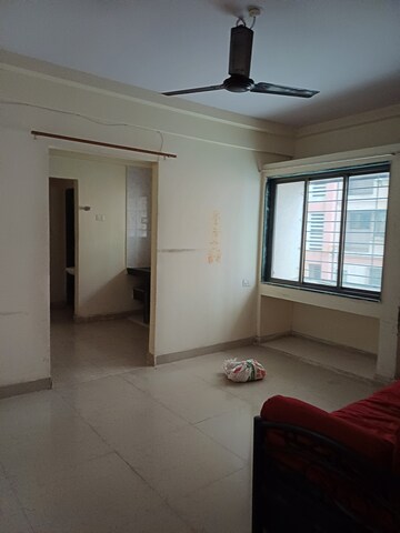 Living Room in 1 BHK Apartment at Megh Malhar Co-op Housing Society, Ghansoli – for Rent