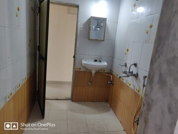 Bathroom in 2 BHK Apartment at Manyata CHS, Tilak Nagar – for Rent