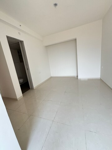 Room in 2 BHK Apartment at Godrej Emerald, Ghodbunder Road – for Sale