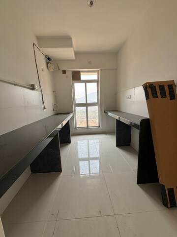 Kitchen in 2 BHK Apartment at Godrej Emerald, Ghodbunder Road – for Sale