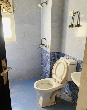 Bathroom in 3 BHK Apartment at Aims Golf City, Sector 75 – for Rent