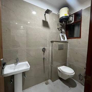 Bathroom in 2 BHK Builder Floor at Chattarpur – for Sale