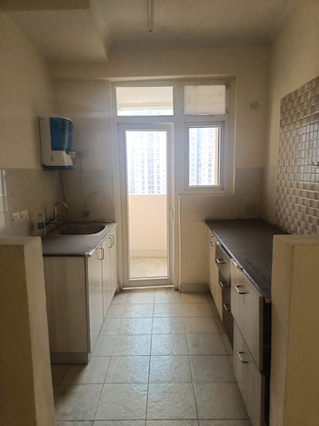 Kitchen in 2 BHK Apartment at Amrapali Silicon City, Sector 76 – for Sale