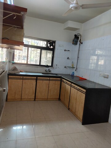 Kitchen in 2 BHK Apartment at Nav Karan Apartment, Andheri West – for Rent