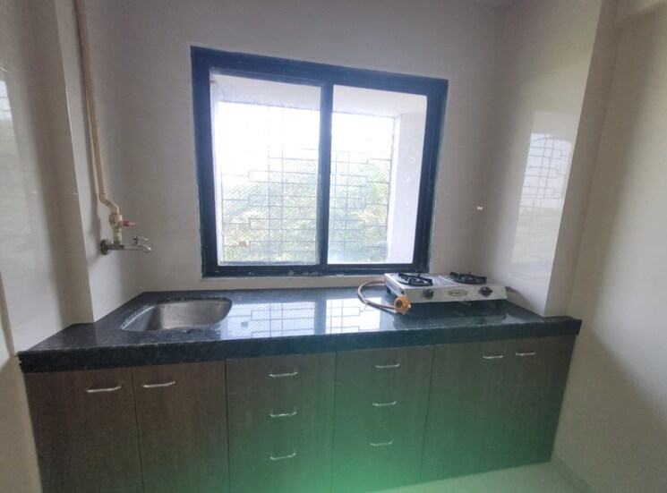 Kitchen, rna-ng-regency-phase-i 1 Bedroom 585 Sq.Ft. Apartment In Balkum Pada Thane 8151818