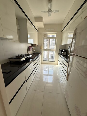 Kitchen in 3 BHK Apartment at Godrej Emerald, Ghodbunder Road – for Sale