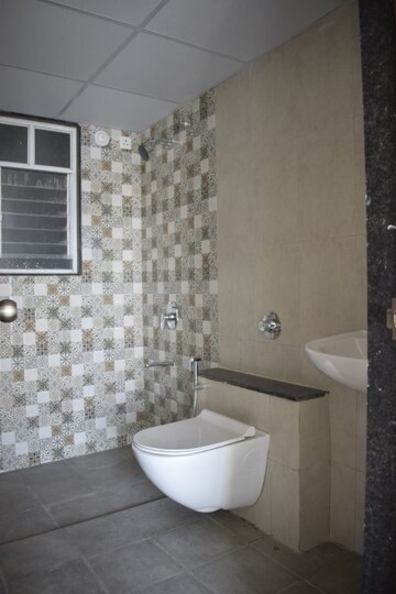 Bathroom in 4 BHK Apartment at Mantra Monarch, Balewadi – for Rent